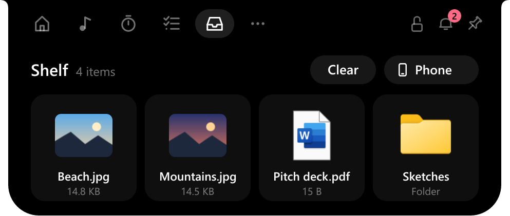 Shelf with two photos, a PDF and a folder